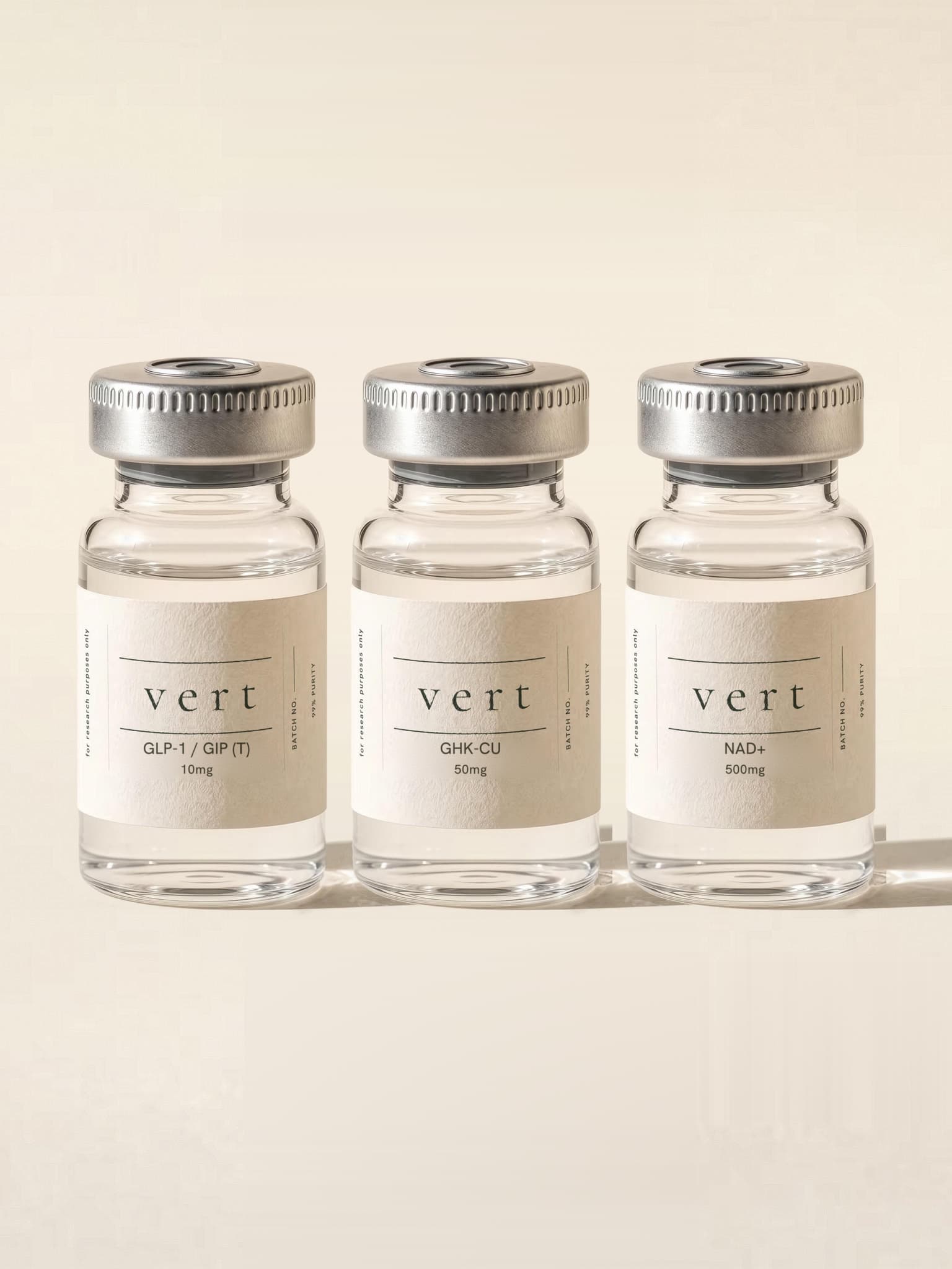 One — three research peptide vials